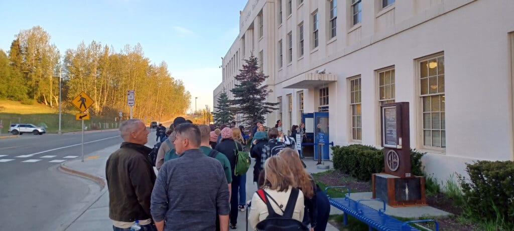 a group of people outside of a building