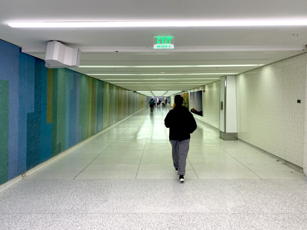 a person walking in a hallway