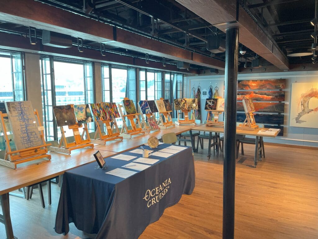 a room with art easels and tables