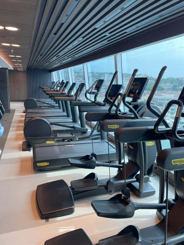 a group of treadmills in a gym