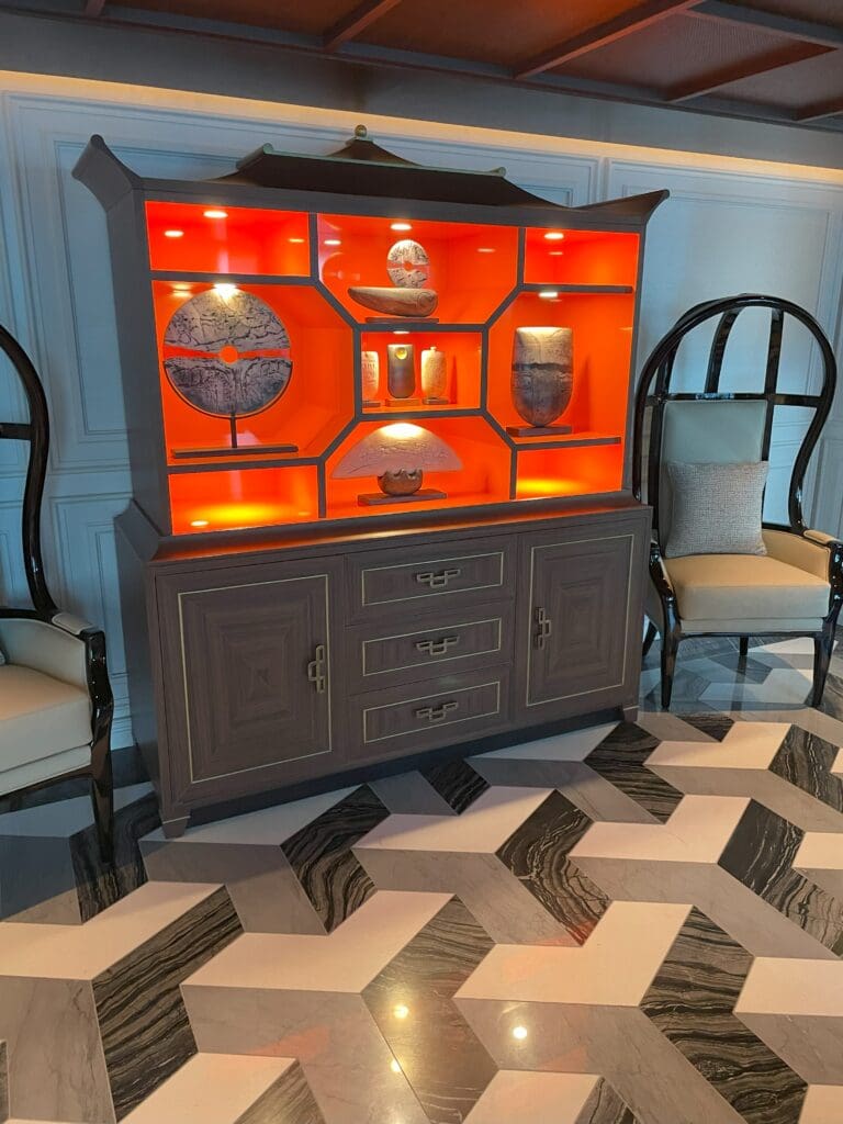 a cabinet with a red light inside