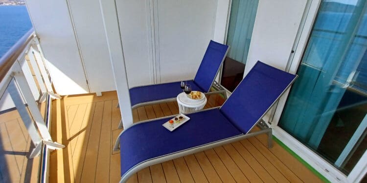 a lounge chairs on a deck