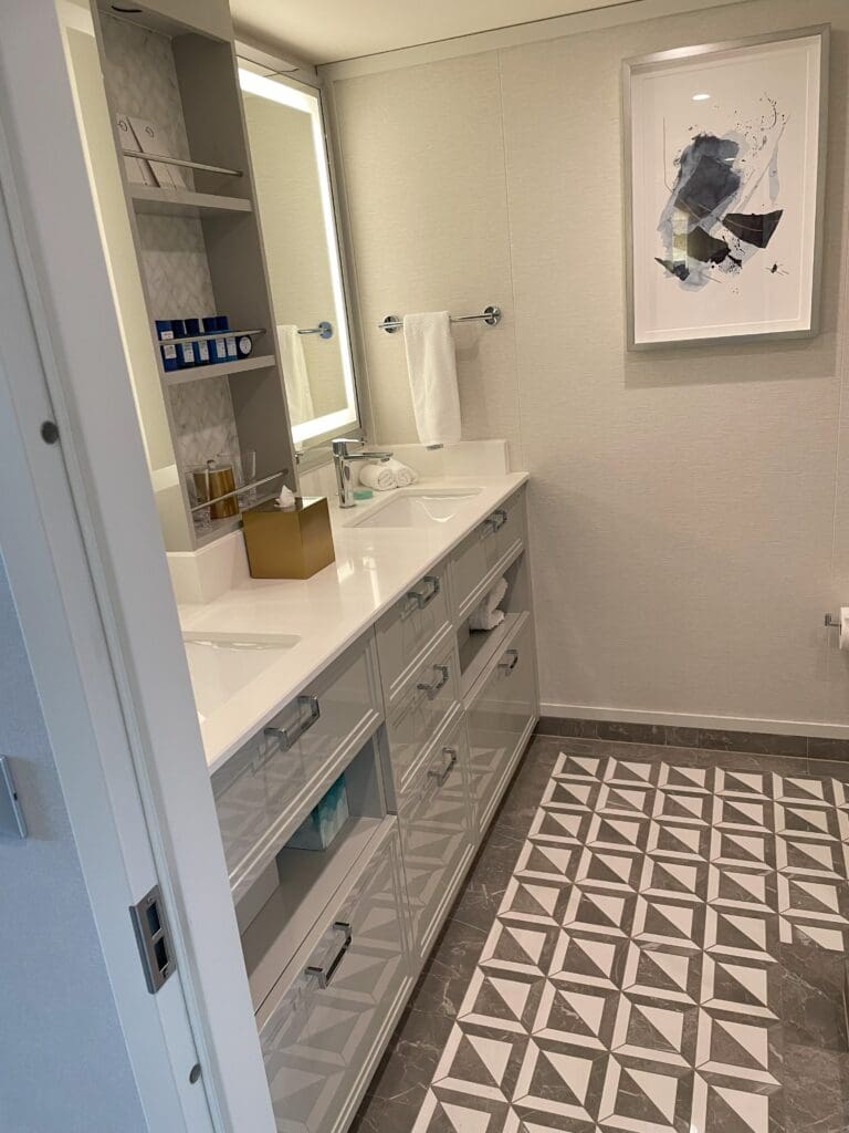 a bathroom with a mirror and sink