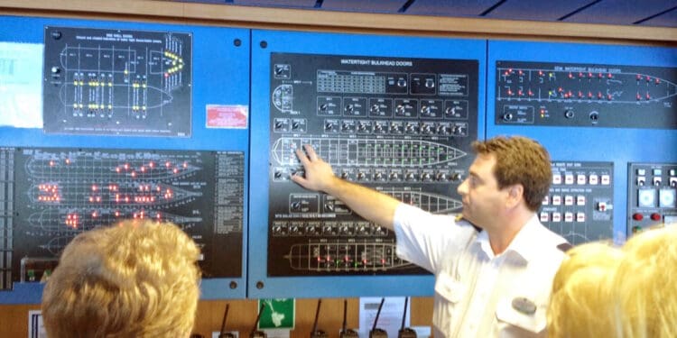 a man pointing at a board