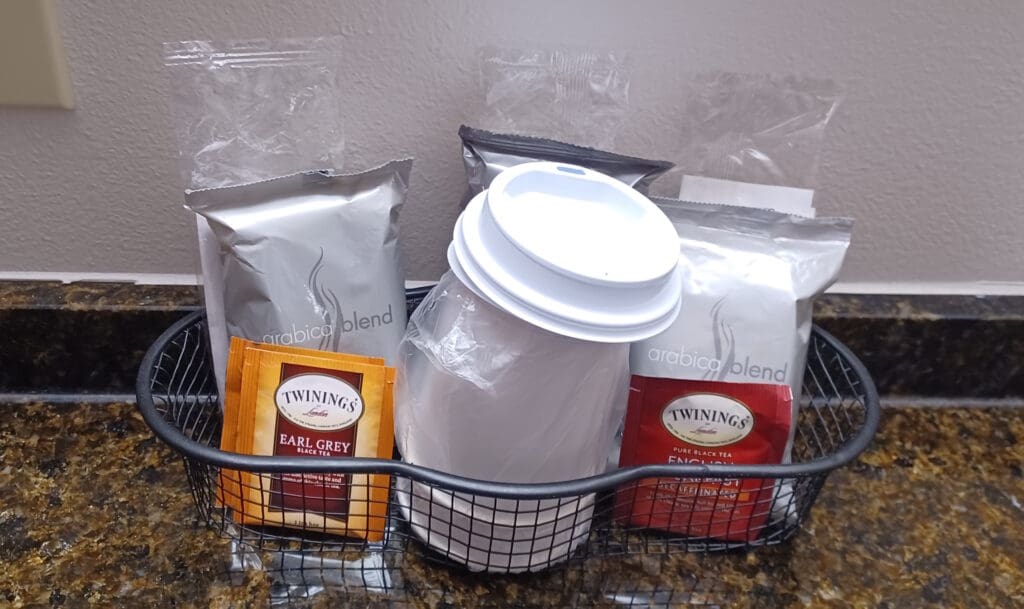 a basket of coffee and tea bags