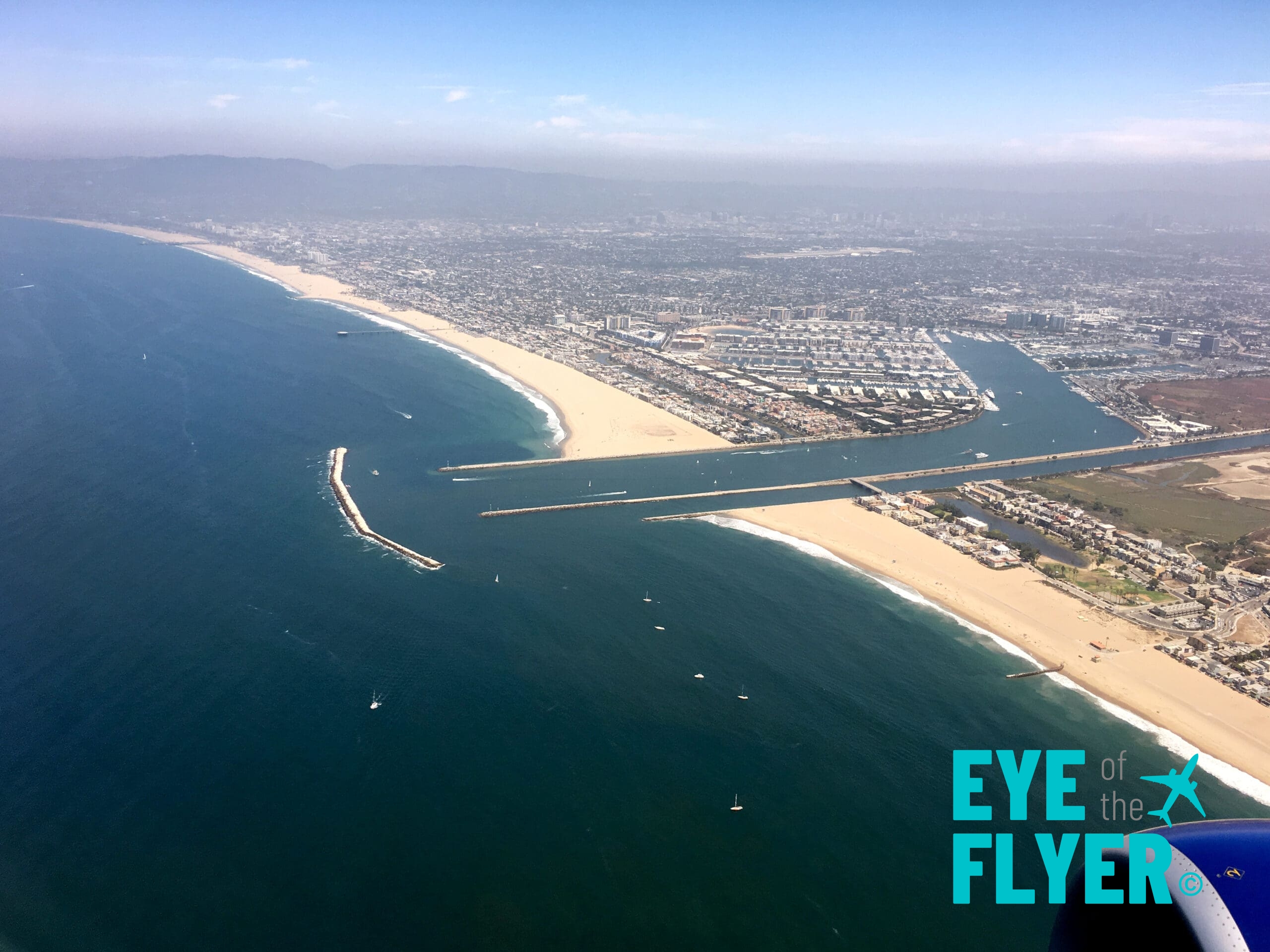 A view of Marina del Rey and Venice Beach while departing Los Angeles International Airport (LAX). Doesn't it look like the breakwater and jetties form a smile?