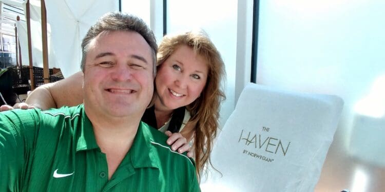 a man and woman taking a selfie