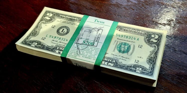a stack of money on a table