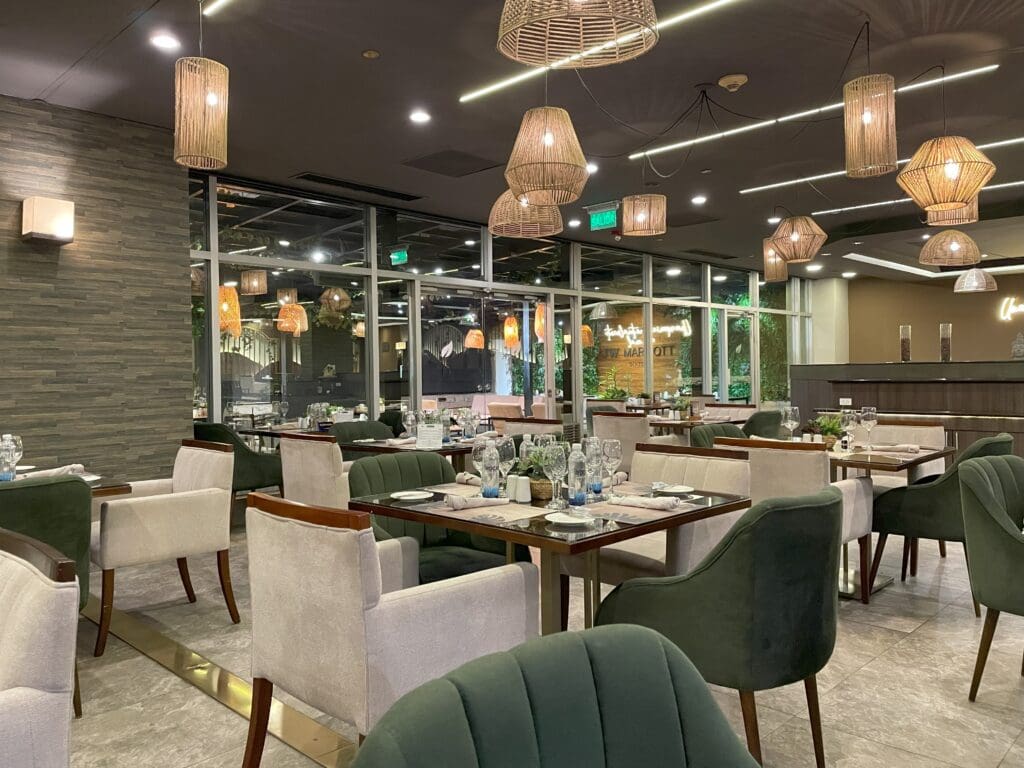 a restaurant with tables and chairs