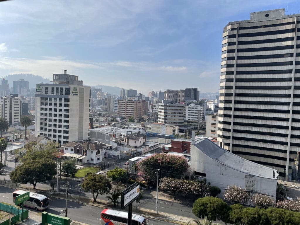 a city with tall buildings and trees