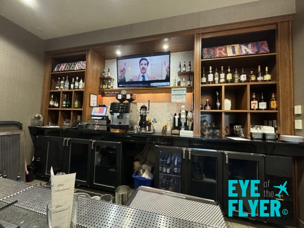 a bar with shelves and a television at SpringHill Suites Las Vegas Convention Center rooftop deck (© Eye of the Flyer)