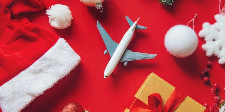 a toy airplane and christmas decorations