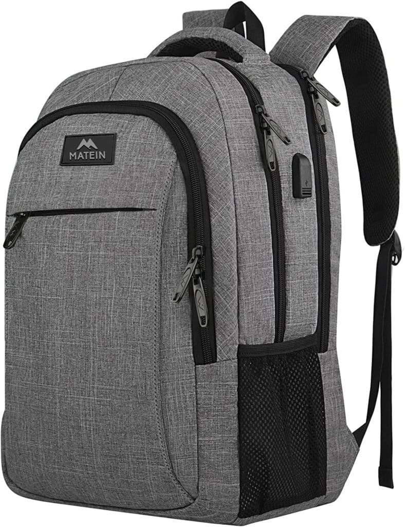 a grey backpack with black straps