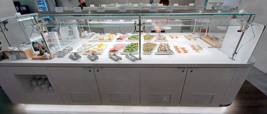 a buffet with different foods on it