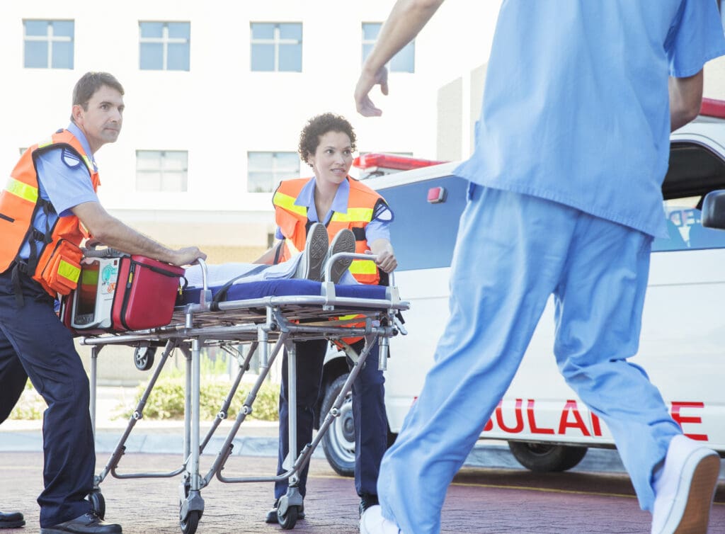 Paramedics rushing a patient into the hospital 