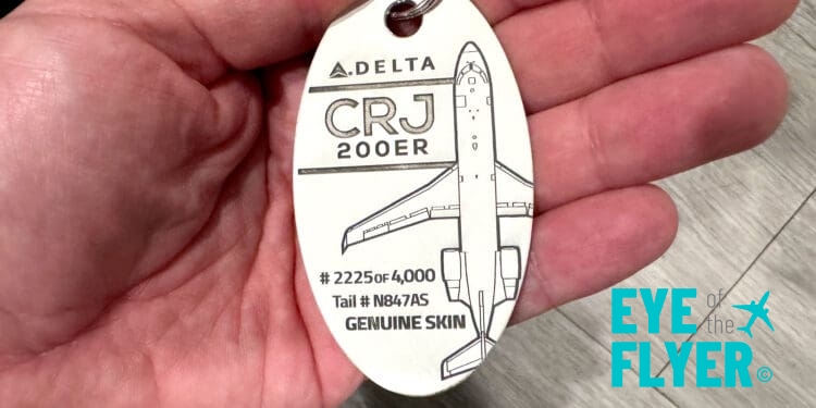 A Plane Tags baggage tag made from a retired Delta Connection CRJ-200.