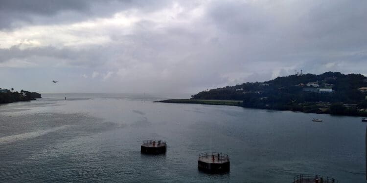 a body of water with two round objects in it