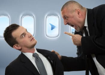 Passengers fight over window shades