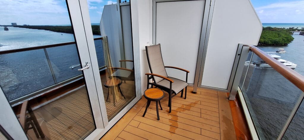 a chair and table on a deck