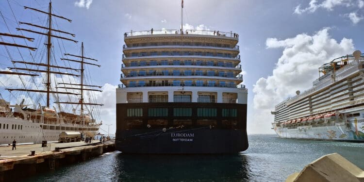 a large ship docked at a dock