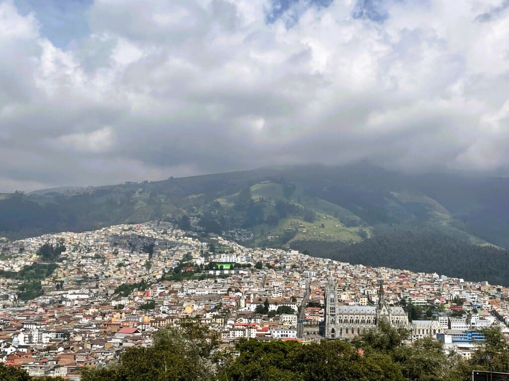 a city with a hill in the background