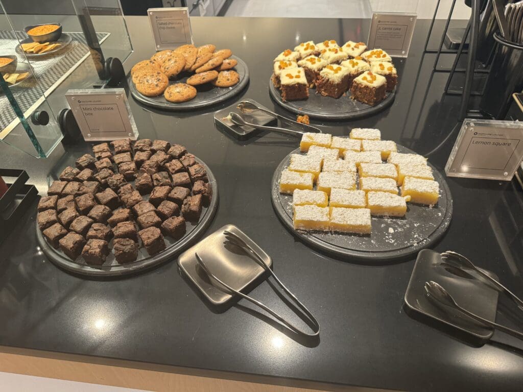 a table with different desserts on it