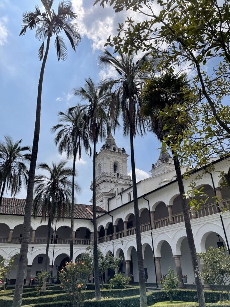 a building with palm trees