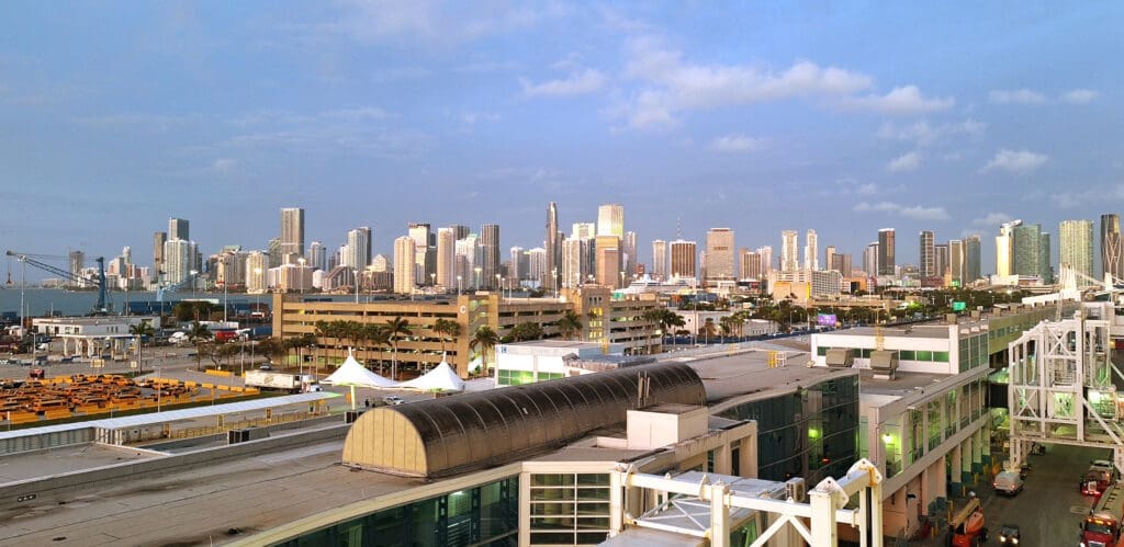 a city skyline with a large building