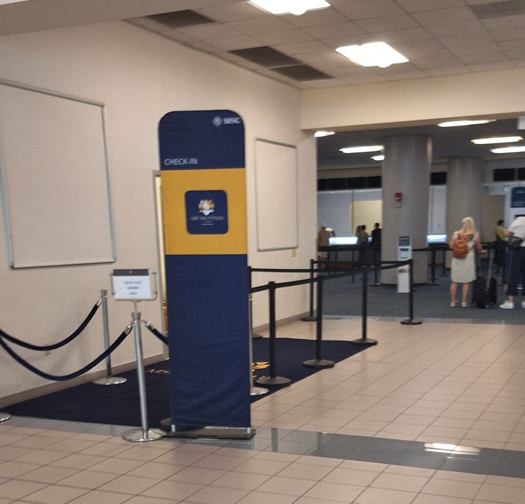 a blue and yellow sign in a building