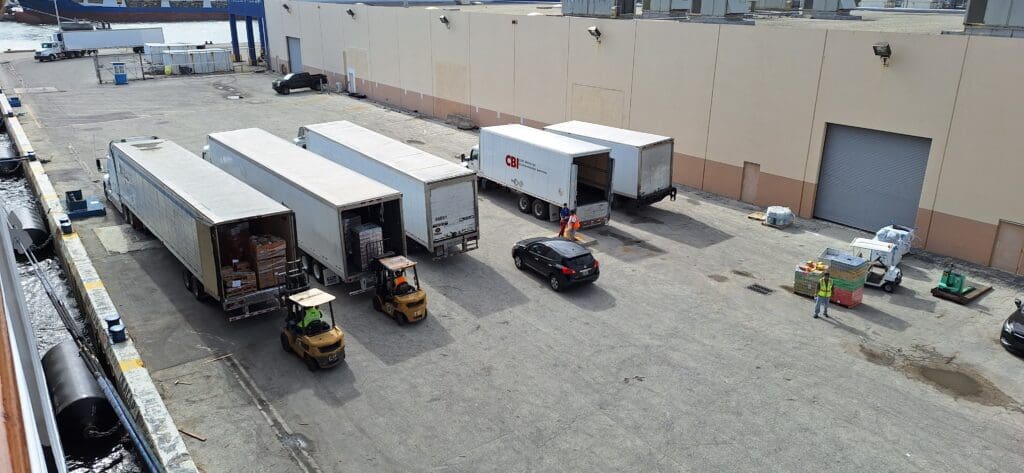 a group of trucks and a forklift