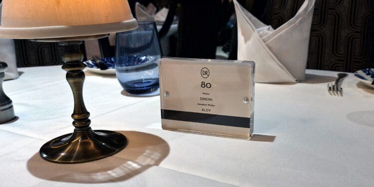a table with a name card on it