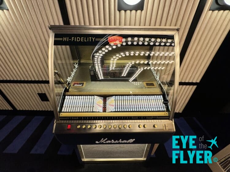 a jukebox with lights in front of it