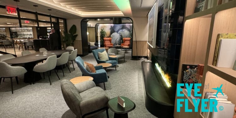 a room with a television and chairs