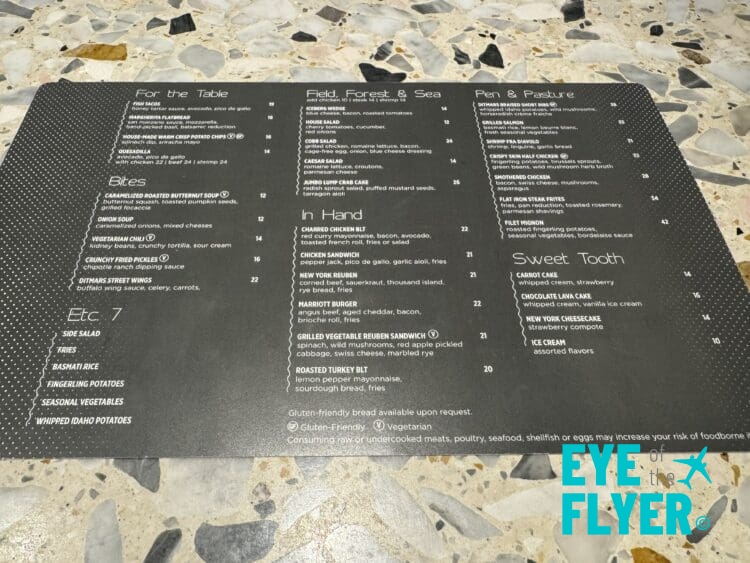 a black sign with white text on it