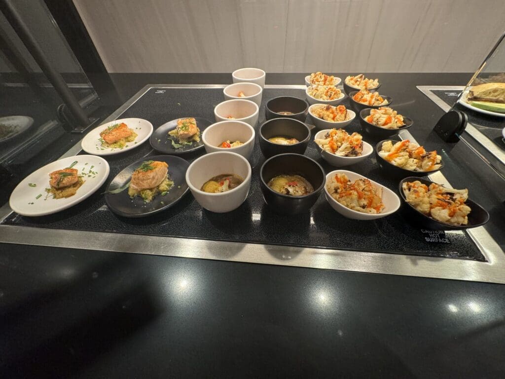 a group of small bowls of food on a table