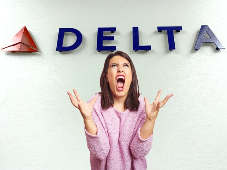 A female passenger screams in front of the Delta Air Lines logo