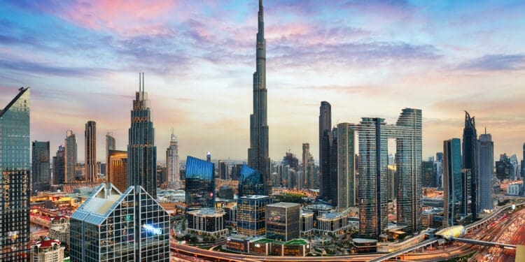 Amazing skyline of Dubai City center and Sheikh Zayed road intersection, United Arab Emirates - a city skyline with many tall buildings
