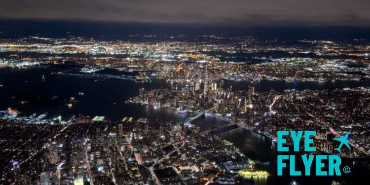 A view of Manhattan in New York City at night while flying into LaGuardia Airport.
