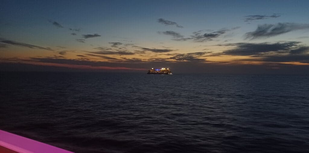 a boat in the middle of the ocean