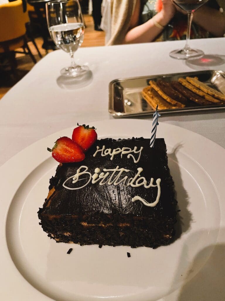 a chocolate cake with strawberries on top