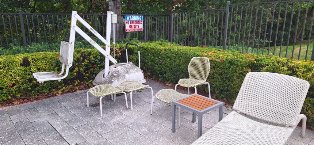 a group of chairs and a table outside