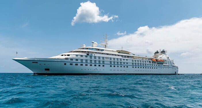 a large white ship in the water