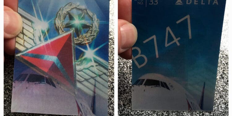 a hand holding a card