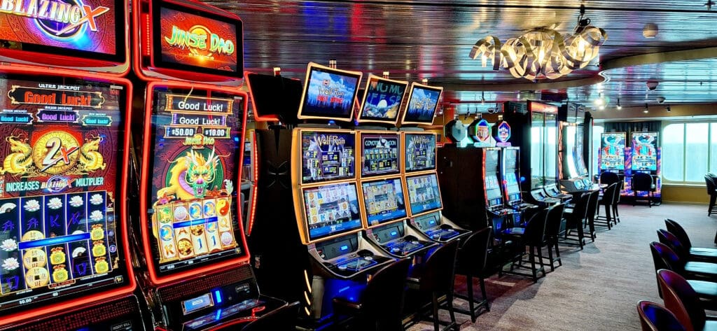 a row of slot machines in a casino