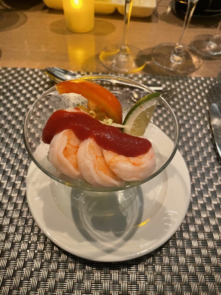 a shrimp cocktail in a glass bowl