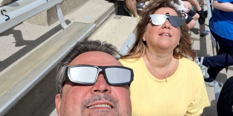 a man and woman wearing sunglasses