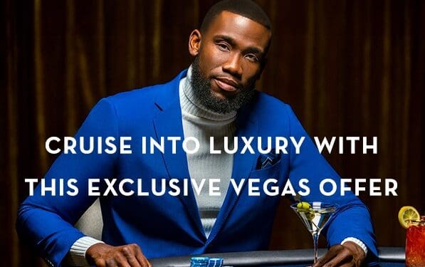 a man in a blue suit at a poker table