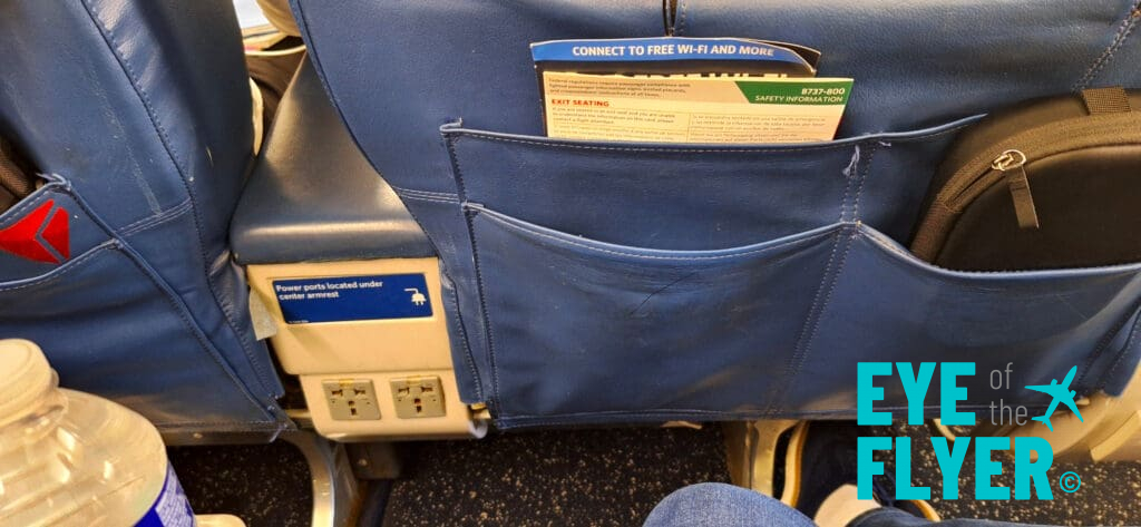 a blue pocket on a seat