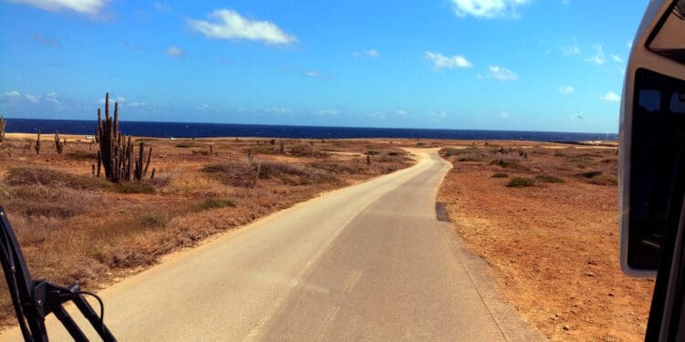 a road going through a dry landscape
