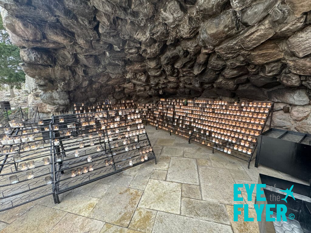 a group of candles in a cave